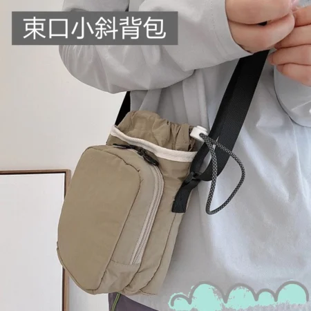 S077｜牛津布束口斜背包 輕便休閒側背包 拉鍊前袋隨身小包
